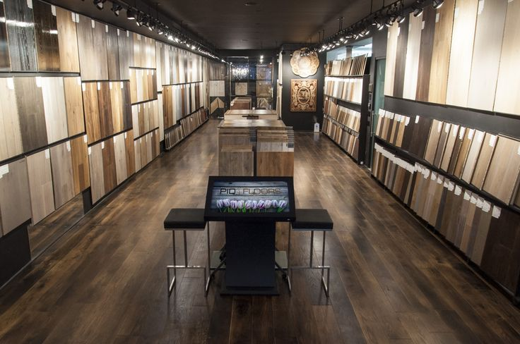Aisle of wood-finish panel samples on display